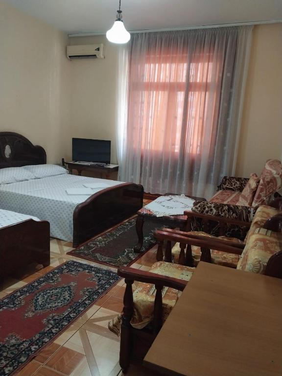 TV a/nebo společenská místnost v ubytování Hotel Luli City Center