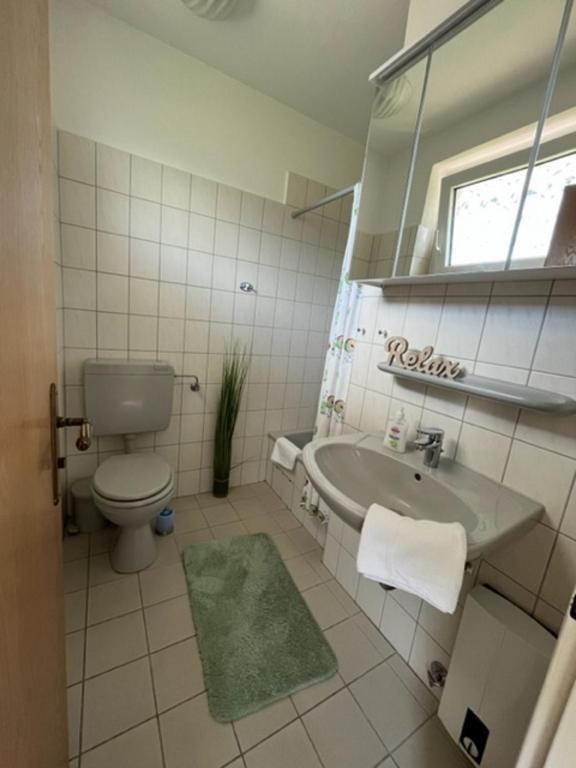 Koupelna v ubytování FeWo Meer-Kur