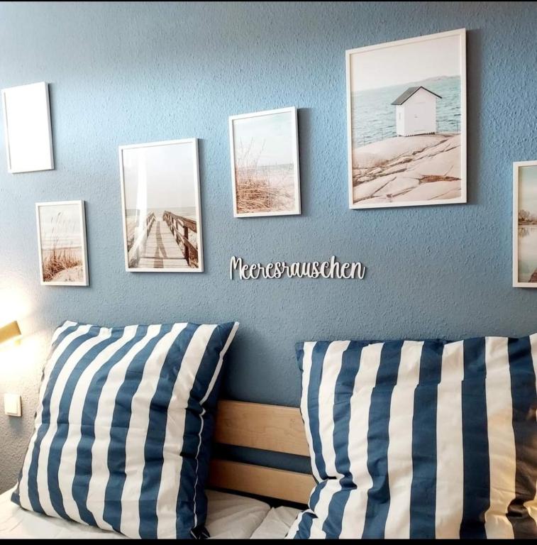 Postel nebo postele na pokoji v ubytování FeWo Meer-Kur