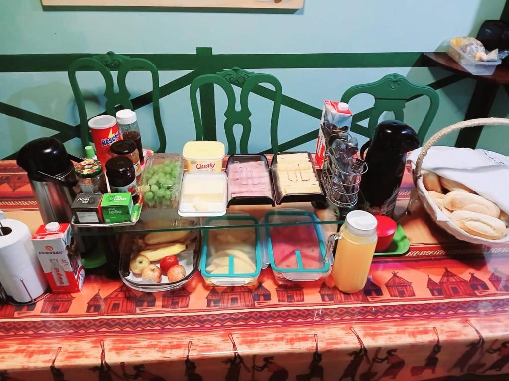 Hotel riosoleilcopacabana, a table with a tray of food on it at riosoleilcopacabana in Rio de Janeiro