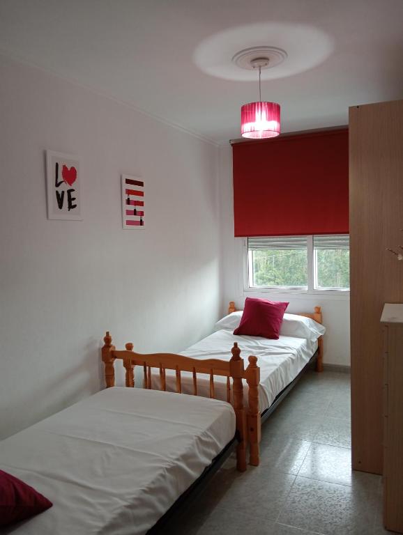 Postel nebo postele na pokoji v ubytování Apartamento Finisterra
