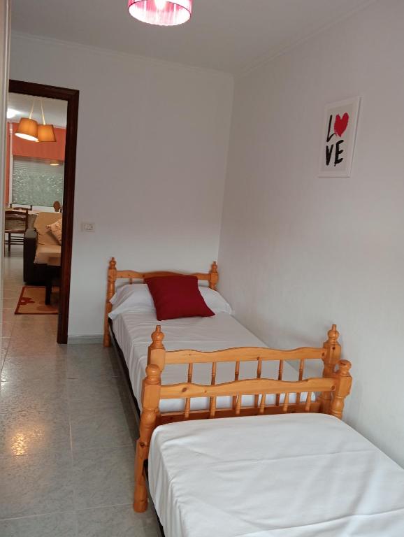 Postel nebo postele na pokoji v ubytování Apartamento Finisterra