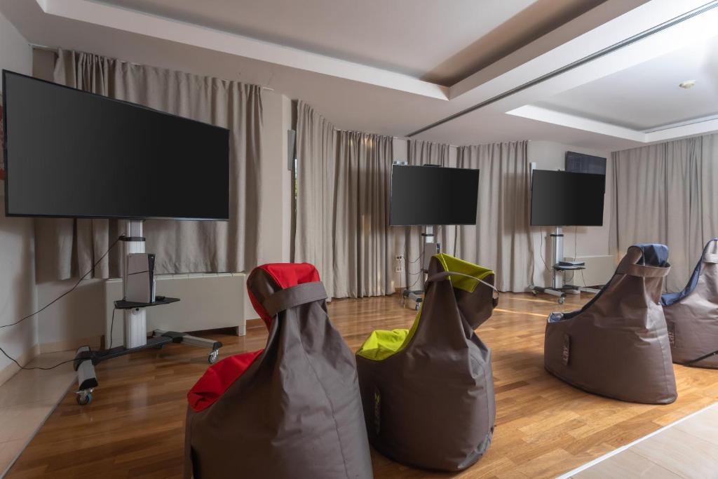 TV a/nebo společenská místnost v ubytování Family Hotel La Luna - All inclusive