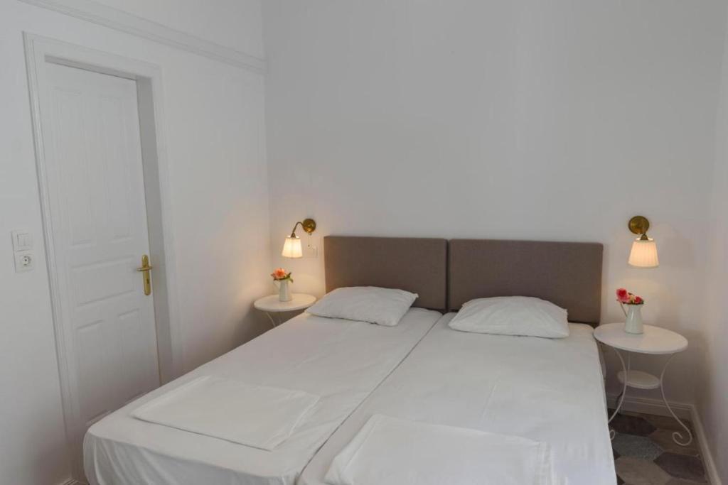 A bed or beds in a room at Filenia