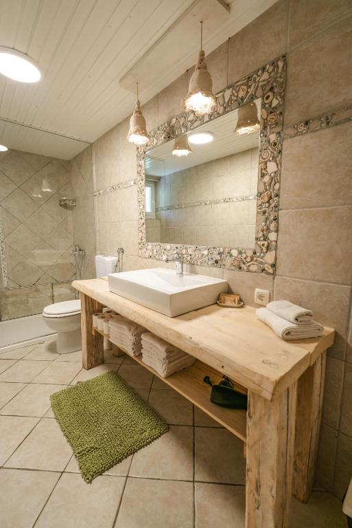 Koupelna v ubytování Apartments Trata