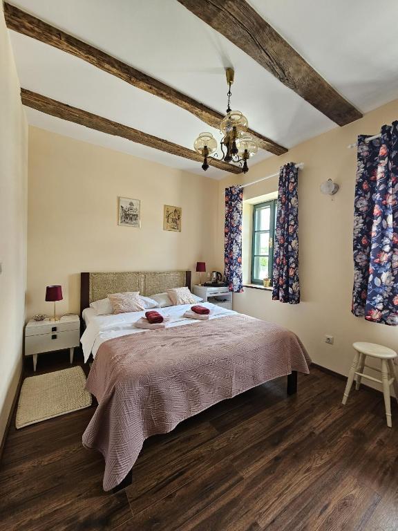 Posteľ alebo postele v izbe v ubytovaní Taverna 1860 Rooms & Apartments