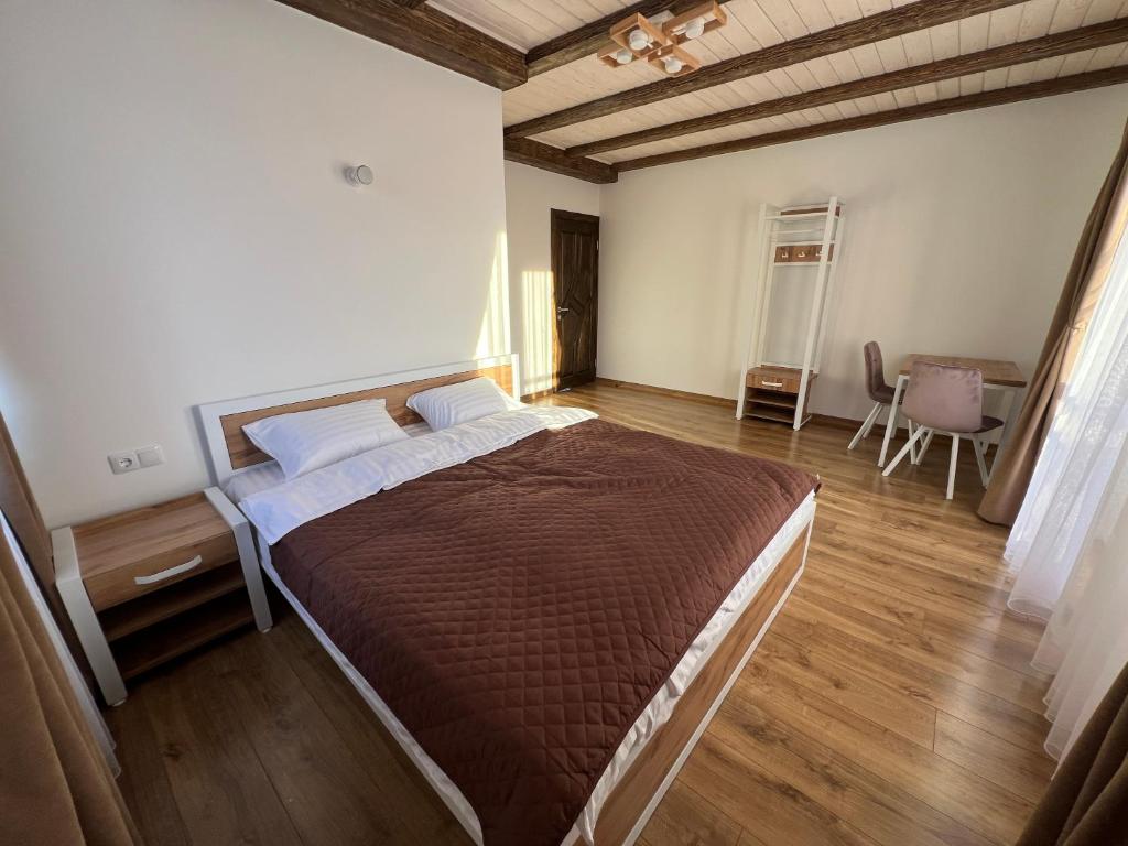Postel nebo postele na pokoji v ubytování Kolos house