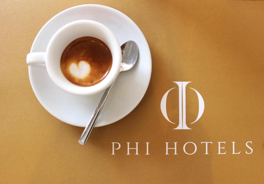 Certifikát, hodnocení, plakát nebo jiný dokument vystavený v ubytování Phi Hotel Ambra