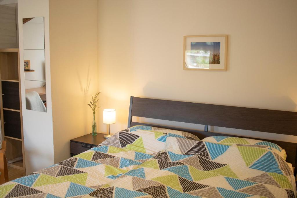 Postel nebo postele na pokoji v ubytování Borea Rooms - Sobe Budanje