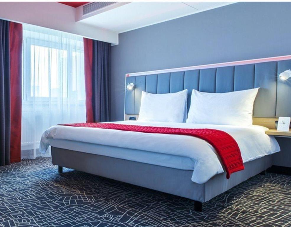 Postel nebo postele na pokoji v ubytování Green Tower Hotel