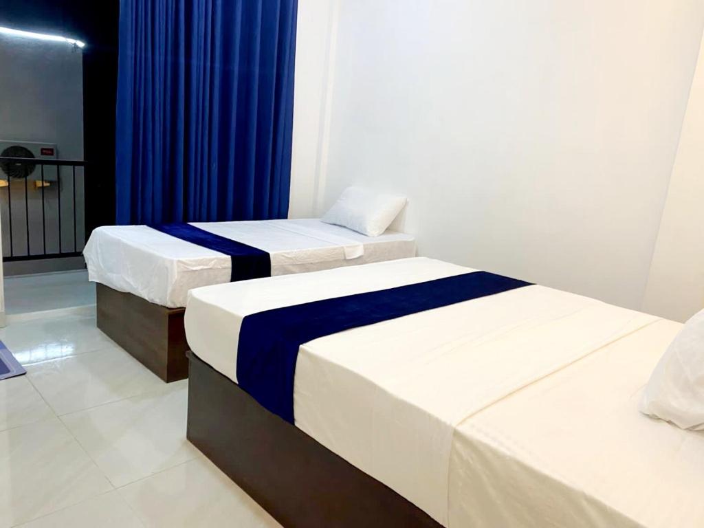 Postel nebo postele na pokoji v ubytování Numaaya Resorts