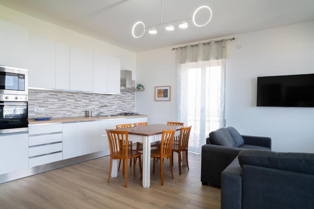 Kuchyň nebo kuchyňský kout v ubytování FRONTEMARE Suites