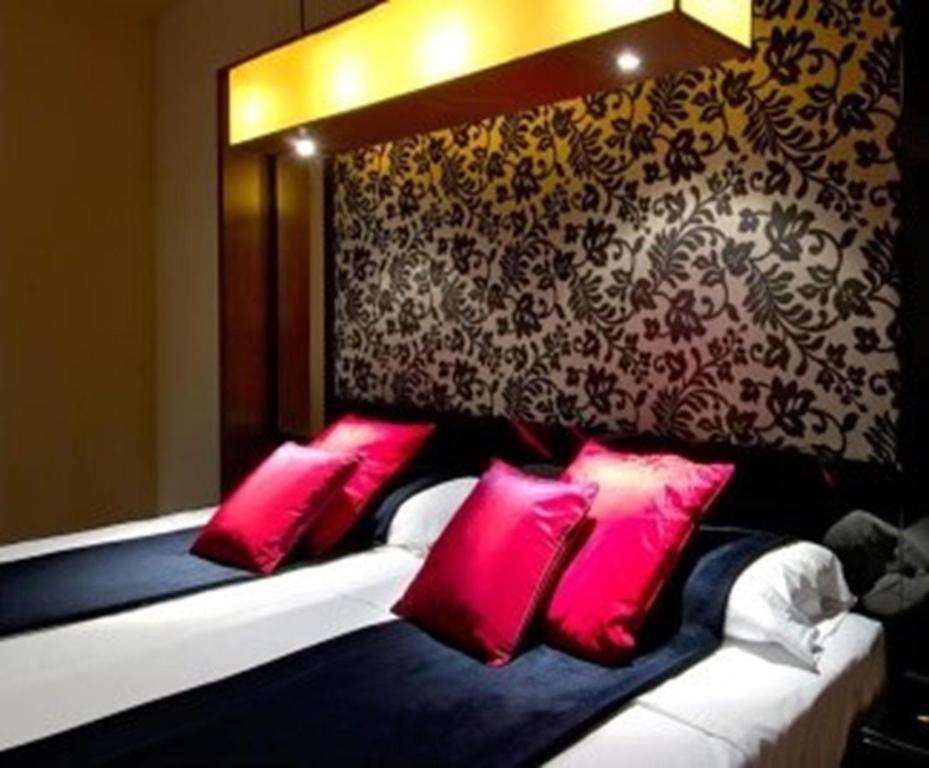 Postel nebo postele na pokoji v ubytování Green Tower Hotel