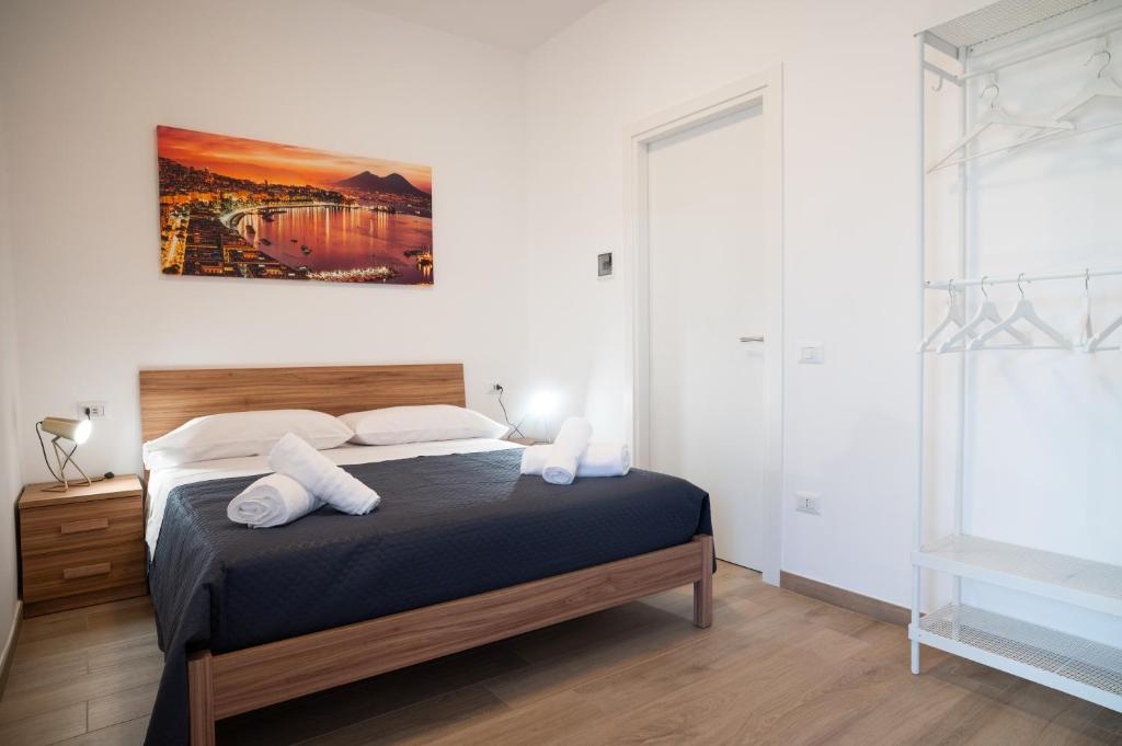 Postel nebo postele na pokoji v ubytování FRONTEMARE Suites