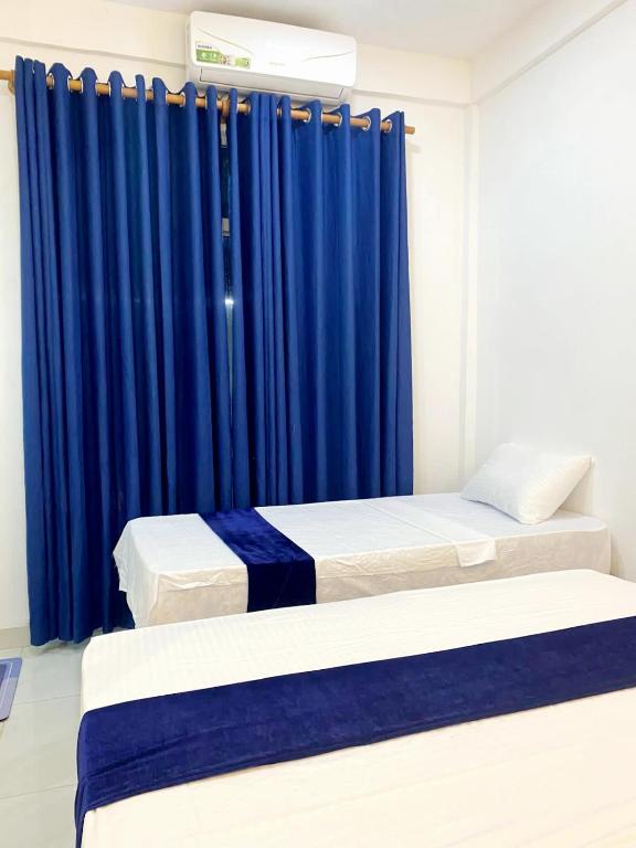 Postel nebo postele na pokoji v ubytování Numaaya Resorts