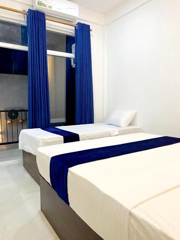 Postel nebo postele na pokoji v ubytování Numaaya Resorts