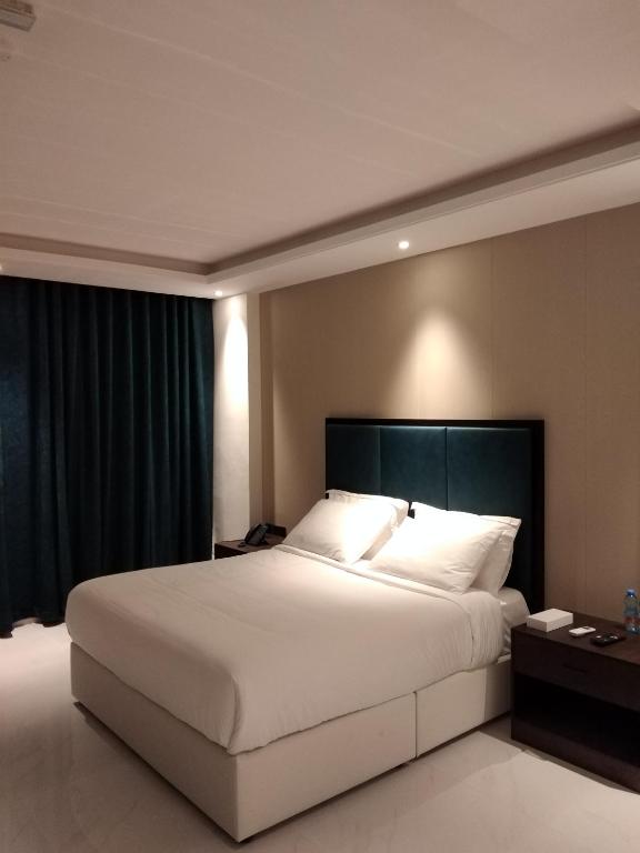 Postel nebo postele na pokoji v ubytování Nebula Hotel