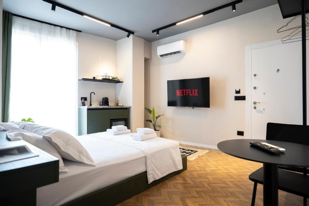 TV a/nebo společenská místnost v ubytování MUZ Studios