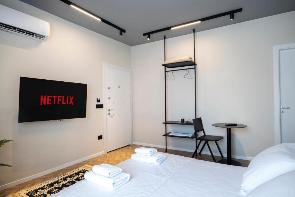 Postel nebo postele na pokoji v ubytování MUZ Studios