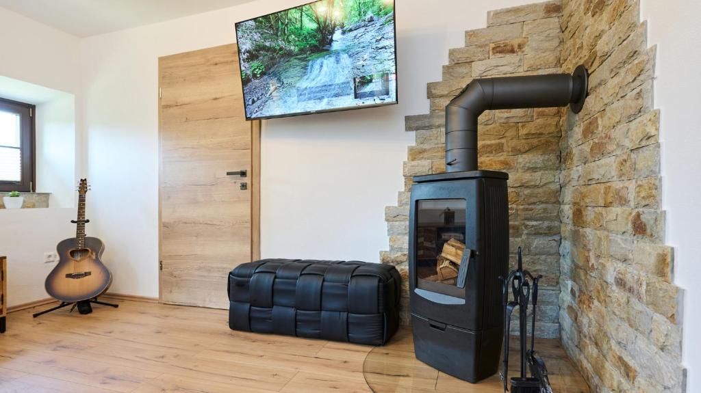 TV a/nebo společenská místnost v ubytování Vista Larix Chalet