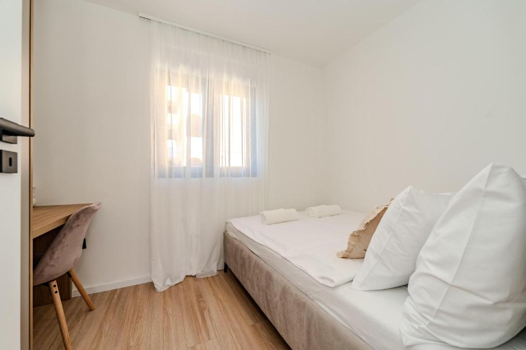 Postel nebo postele na pokoji v ubytování Villa Palazzo by Belmont Realty