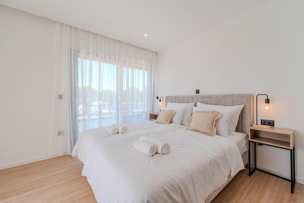 Postel nebo postele na pokoji v ubytování Villa Palazzo by Belmont Realty