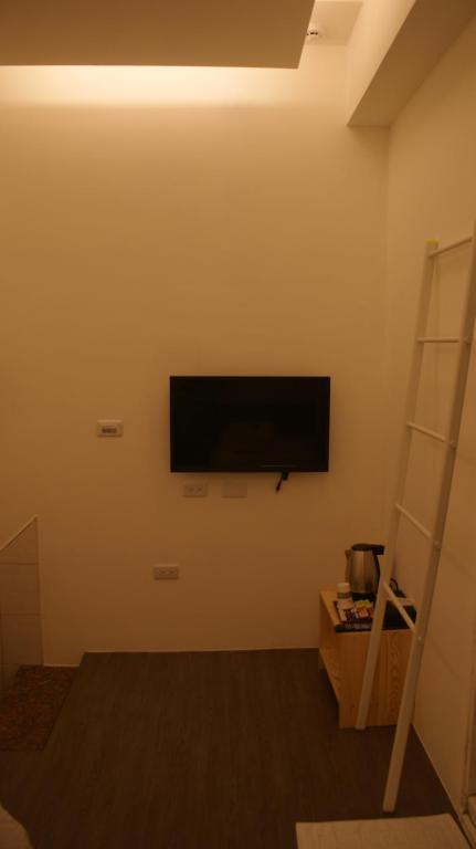 TV a/nebo společenská místnost v ubytování Bai Ji Yi B&B