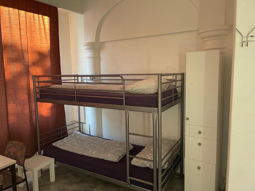 Palanda nebo palandy na pokoji v ubytování Unterkunft Göppingen