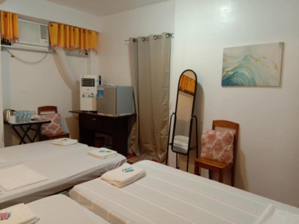 Postel nebo postele na pokoji v ubytování JCV Rooms