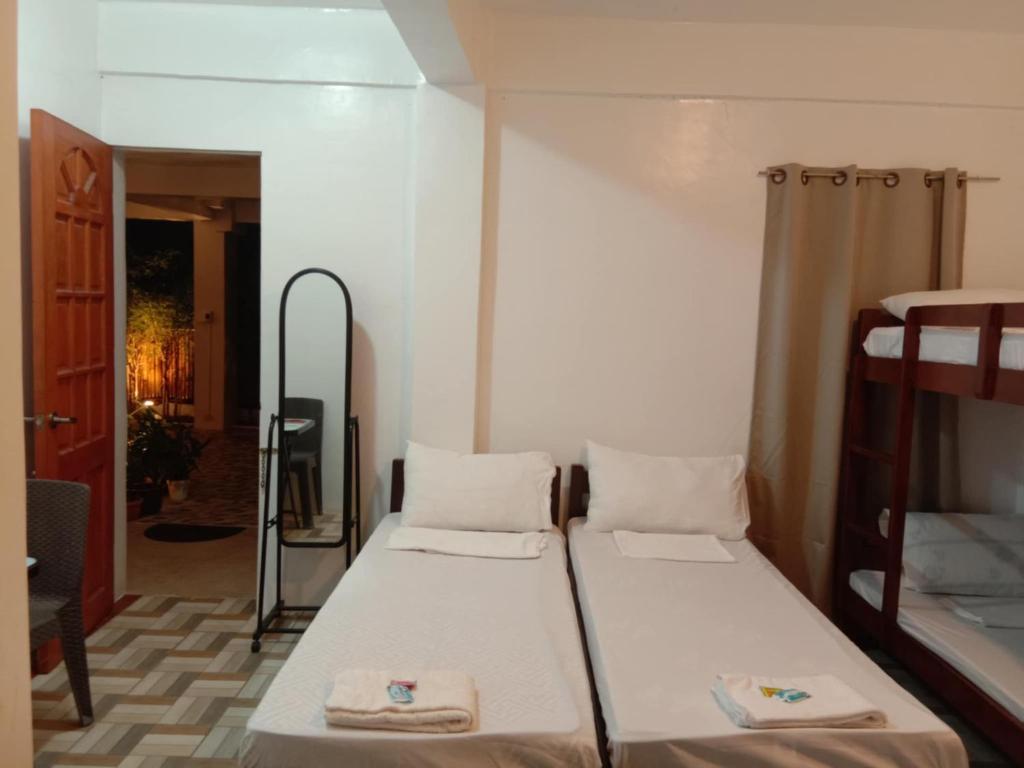 Postel nebo postele na pokoji v ubytování JCV Rooms