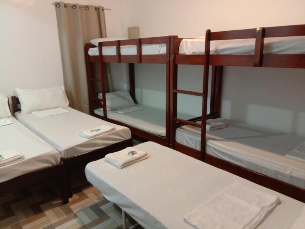 Postel nebo postele na pokoji v ubytování JCV Rooms
