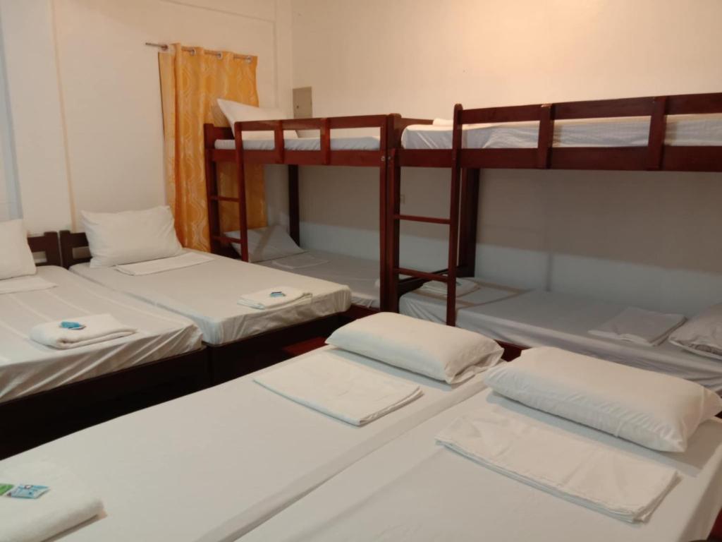 Postel nebo postele na pokoji v ubytování JCV Rooms