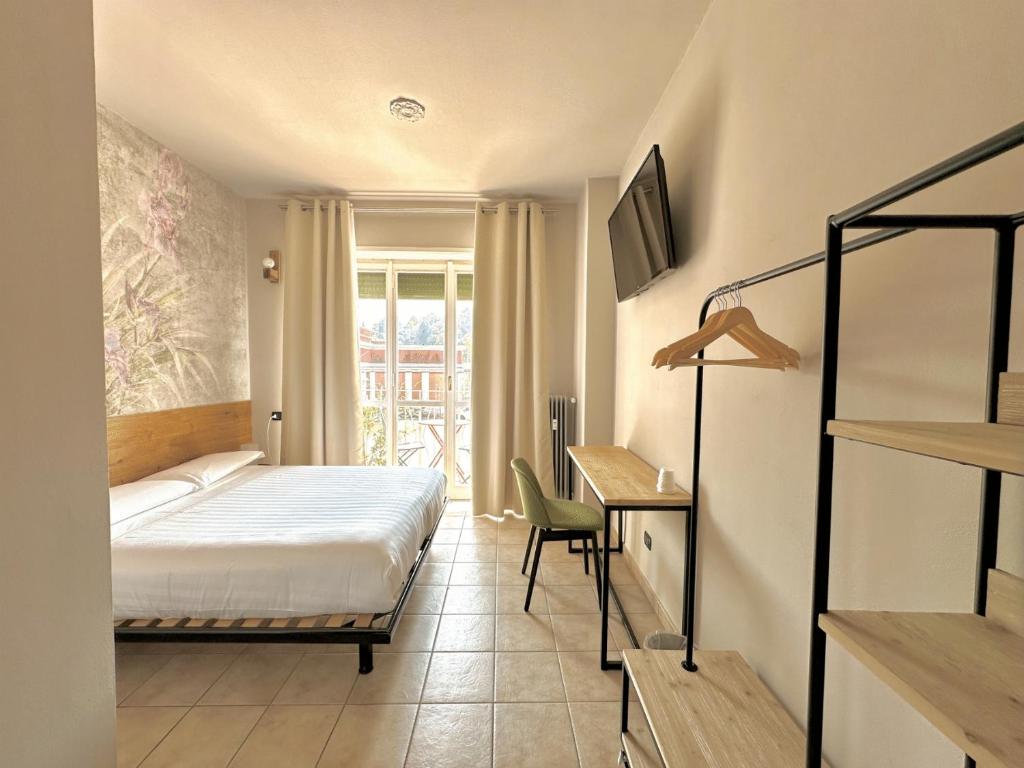 Postel nebo postele na pokoji v ubytování Locanda Da I Baldi