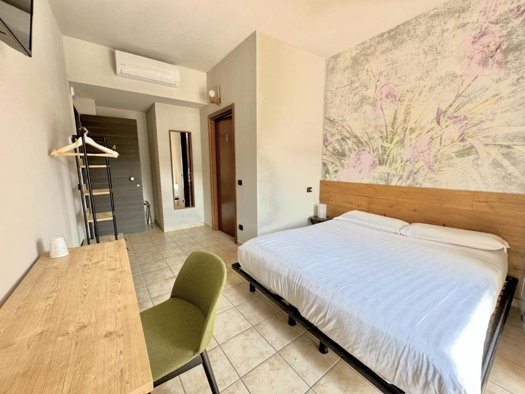 Postel nebo postele na pokoji v ubytování Locanda Da I Baldi