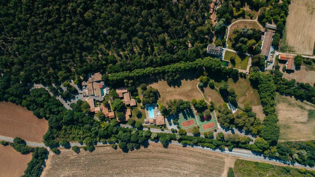 an aerial view of a house in a field at Club Vacances Bleues Domaine de Ch&acirc;teau Laval in Gr&eacute;oux-les-Bains