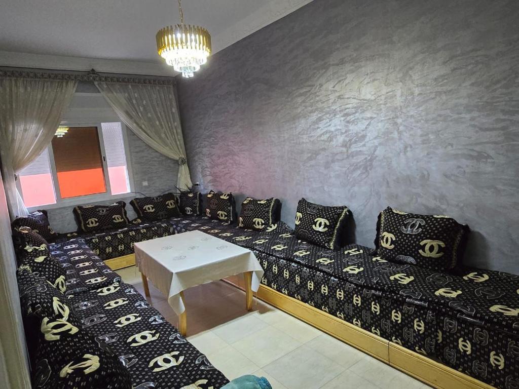 Postel nebo postele na pokoji v ubytování Appartement à louer wadie