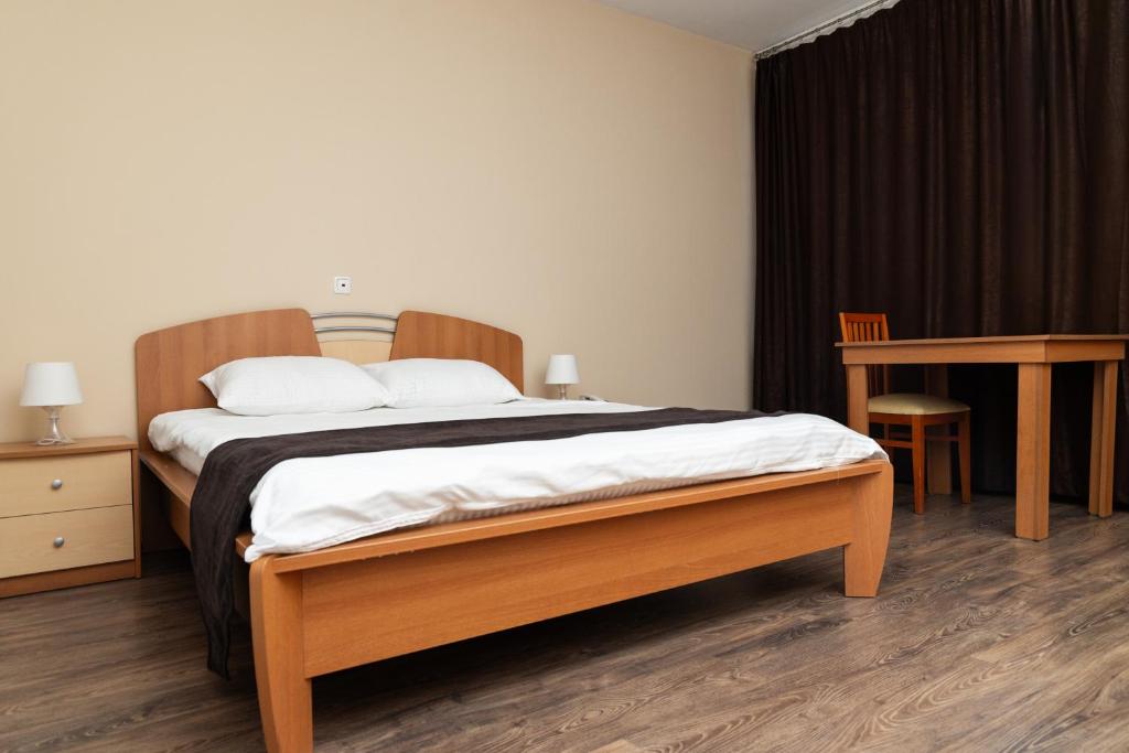 Postel nebo postele na pokoji v ubytování Hotel Luxor