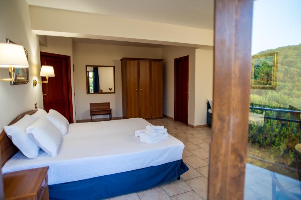 Postel nebo postele na pokoji v ubytování Hotel Bisanzio Resort