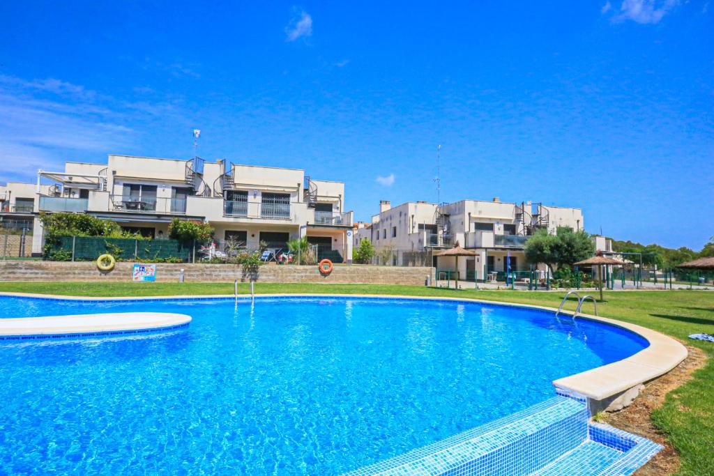 Bazén v ubytování LITORAL COSTA DORADA - LAS TERRAZAS Only families nebo v jeho okolí