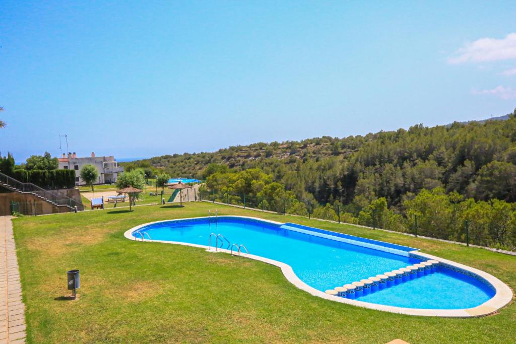 Bazén v ubytování LITORAL COSTA DORADA - LAS TERRAZAS Only families nebo v jeho okolí