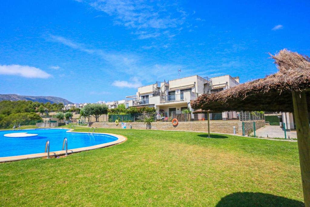 Bazén v ubytování LITORAL COSTA DORADA - LAS TERRAZAS Only families nebo v jeho okolí