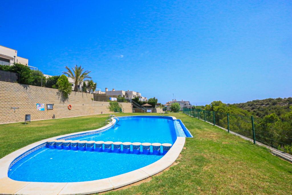 Bazén v ubytování LITORAL COSTA DORADA - LAS TERRAZAS Only families nebo v jeho okolí