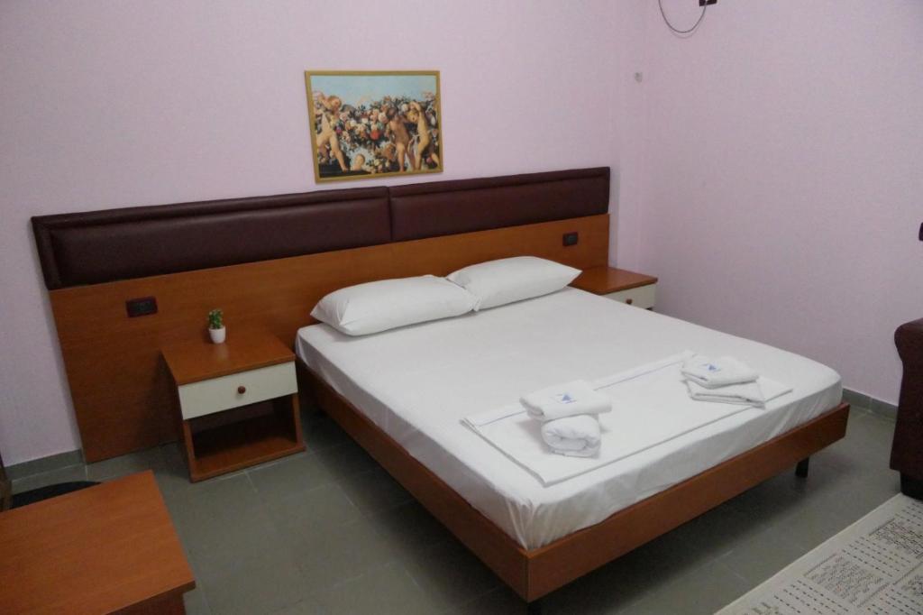 Postel nebo postele na pokoji v ubytování Hotel Edland