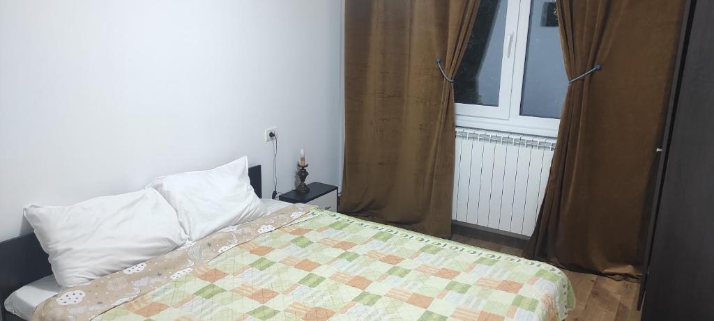 Ένα ή περισσότερα κρεβάτια σε δωμάτιο στο Zamfira Home