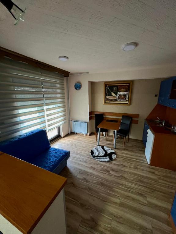 TV a/nebo společenská místnost v ubytování Motel Krstac