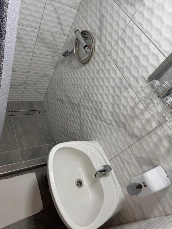 Koupelna v ubytování FÜRDŐ PANZIÓ