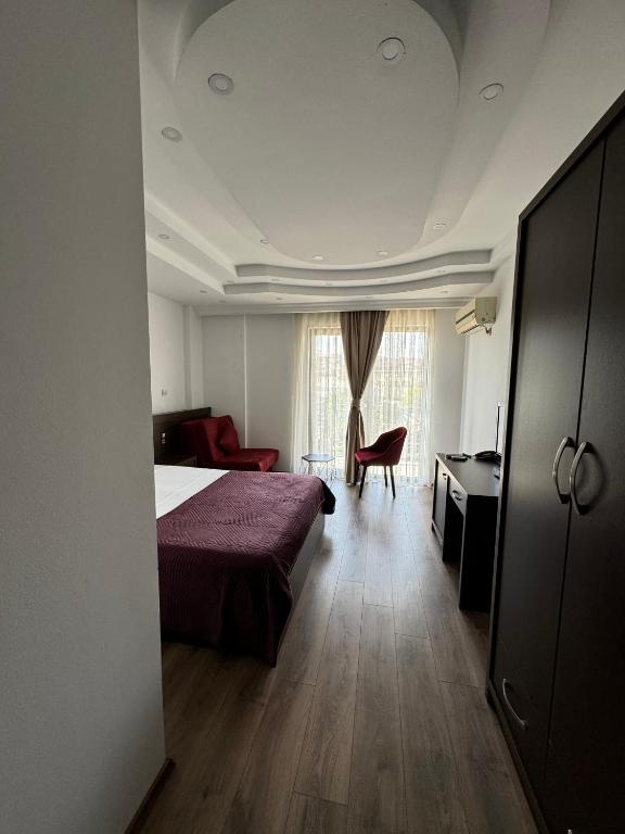 Postel nebo postele na pokoji v ubytování Hotel Real