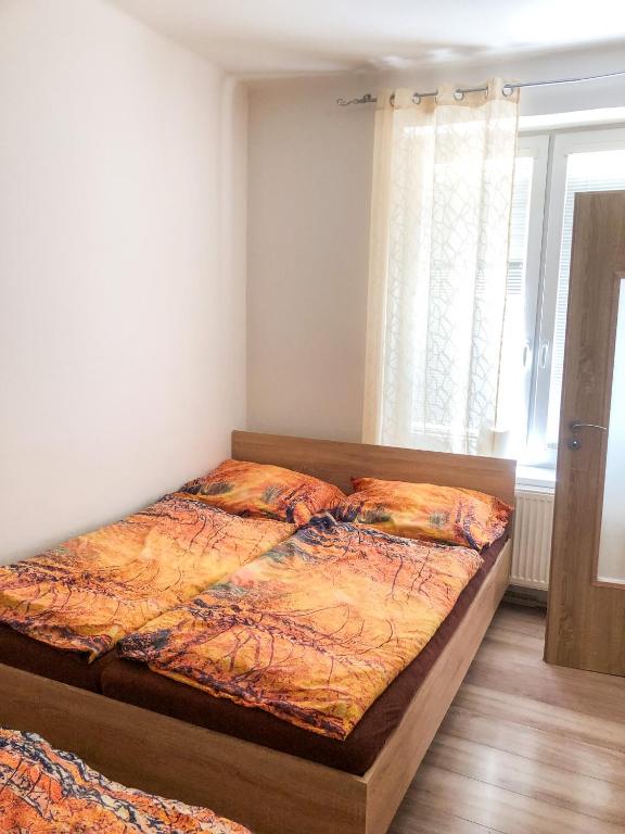Postel nebo postele na pokoji v ubytování M&C Apartmans