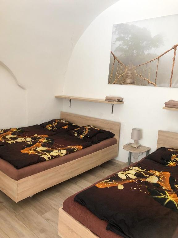 Postel nebo postele na pokoji v ubytování M&C Apartmans