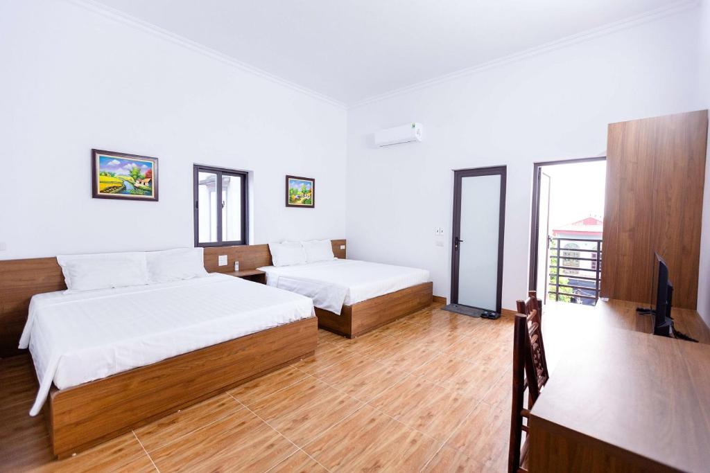Katil atau katil-katil dalam bilik di Newway Homestay Ninh Bình